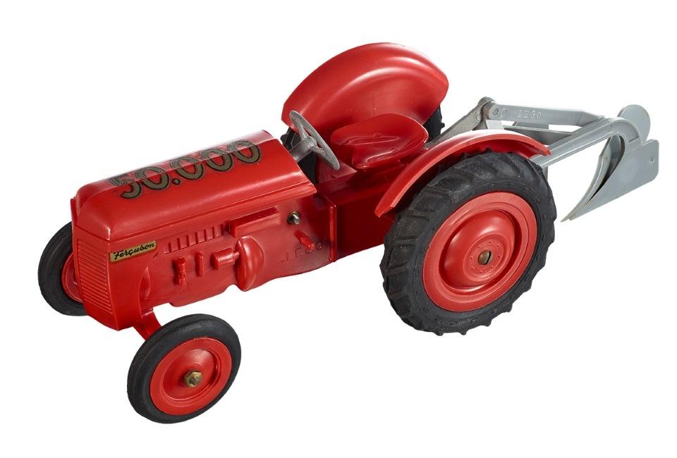 22844 Red tractor with plow